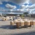 rooftop patio with seating and view of a city